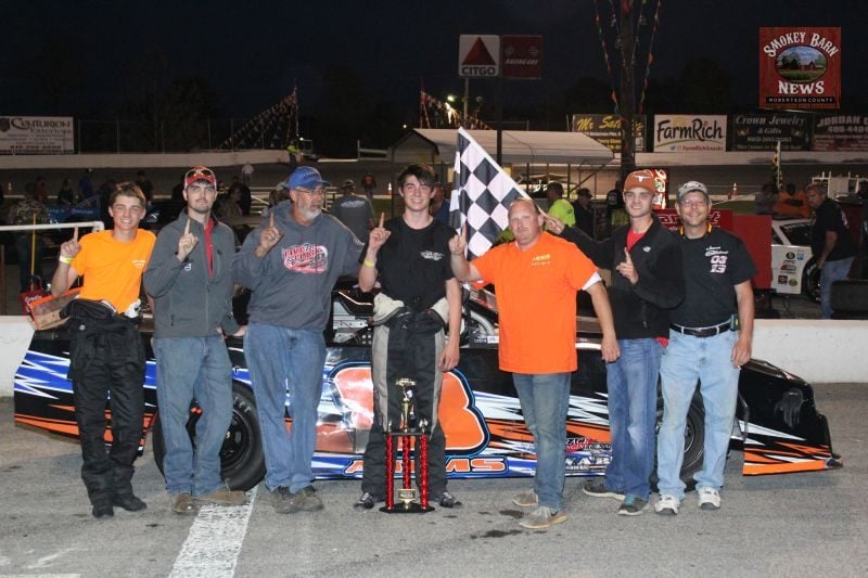 Tanner Arms and Crew in victory lane